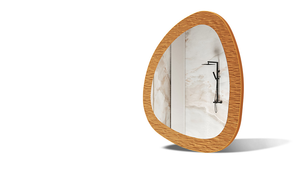 Mirror in a frame with metal decoration. A symbol of modern elegance