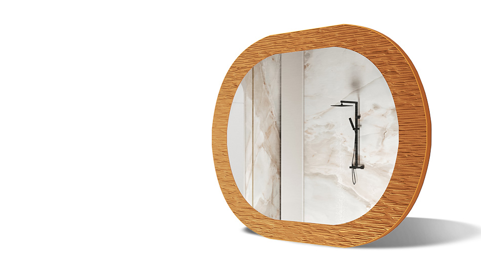 Mirror in a frame with metal decoration. A symbol of modern elegance