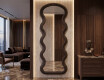 Wavy-shaped mirror in a lacquered UNDULA MDF frame