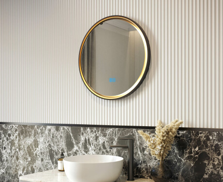 Round mirror in a metal frame with LED lighting